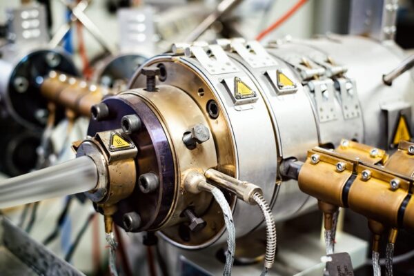 The world of extrusion extruding machine - The World of Extrusions: Different Types, Advantages, Disadvantages and Which Is Right for Your Business - Viking Extrusions Extruder machine for plastic material extrusions.
