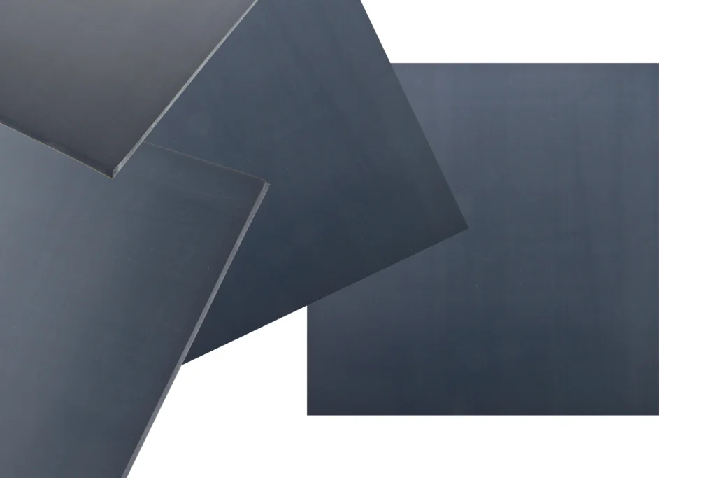 Faded black flame retardant MF775 silicone sheeting scattered across a white background.