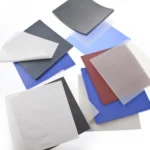 Multiple piles of differently coloured, general purpose FDA silicone sheets.