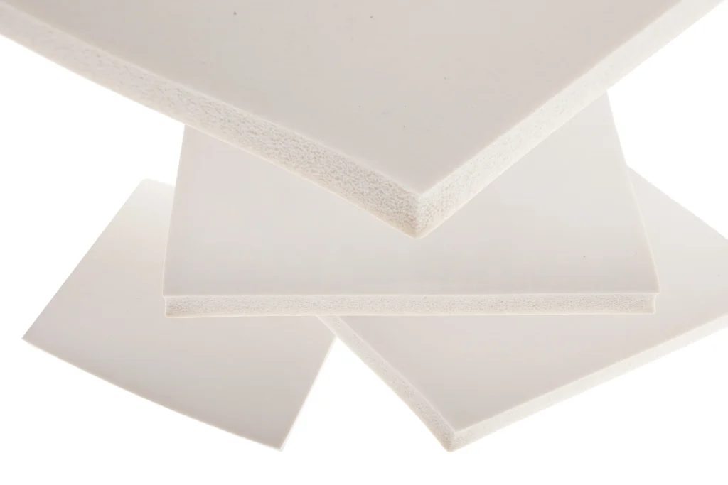 A stack of white high temperature silicone sponge sheets.