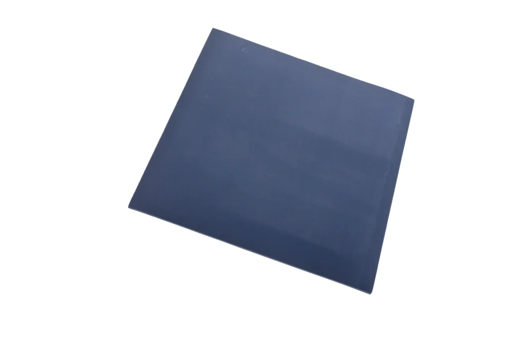 A square sample of of metal detectable silicone sheeting in dark blue.