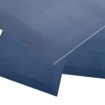A pile of metal detectable silicone sheeting on top of a white background.