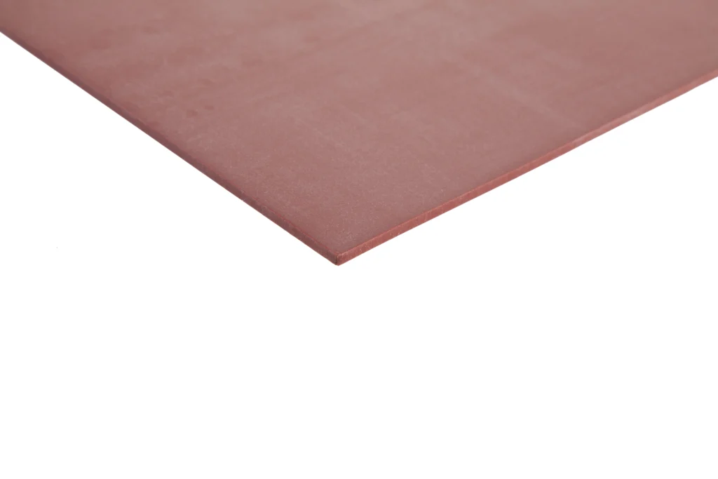 The corner of a red oxide high temperature silicone sheeting.