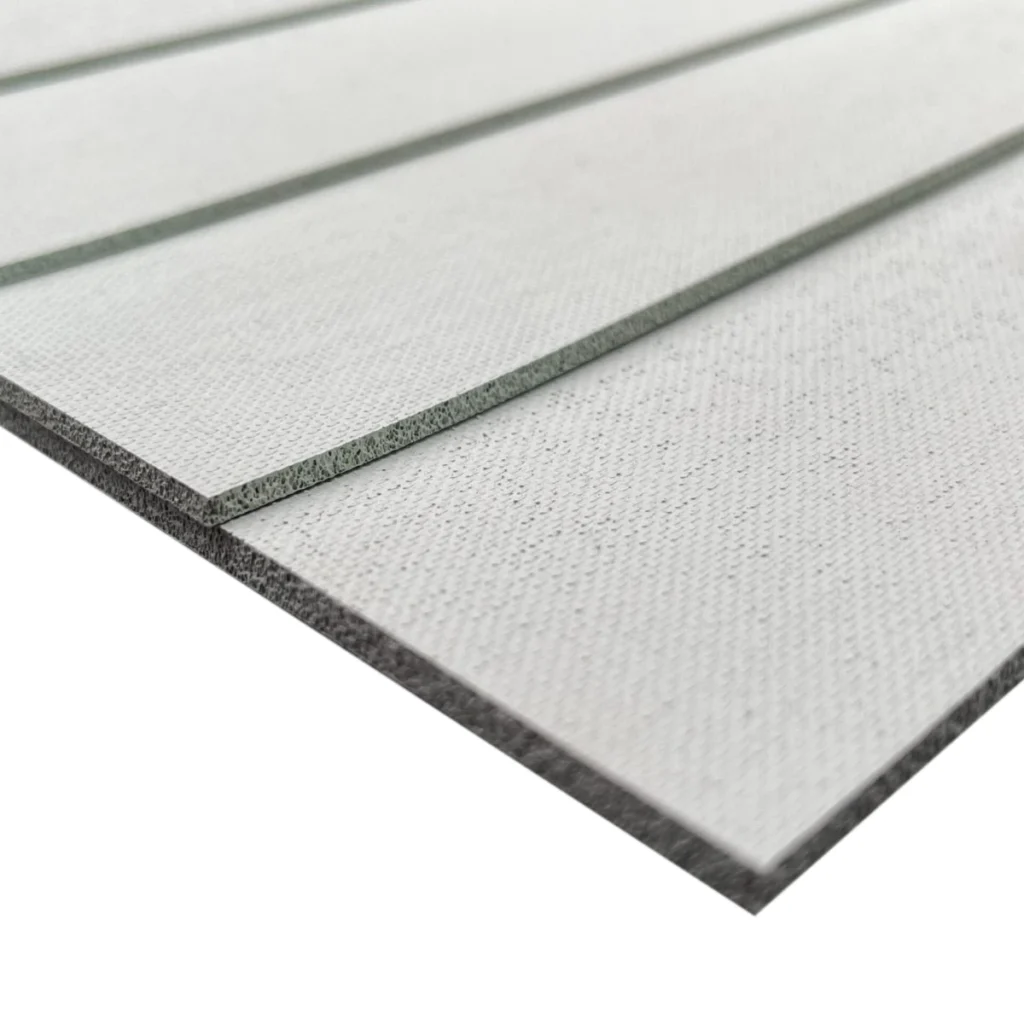 A close up of staggered thermally conductive sponge sheets on top of each other.