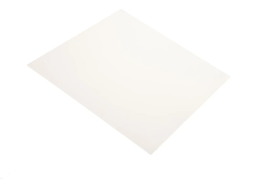 An angled piece of high temperature silicone sheeting in white.
