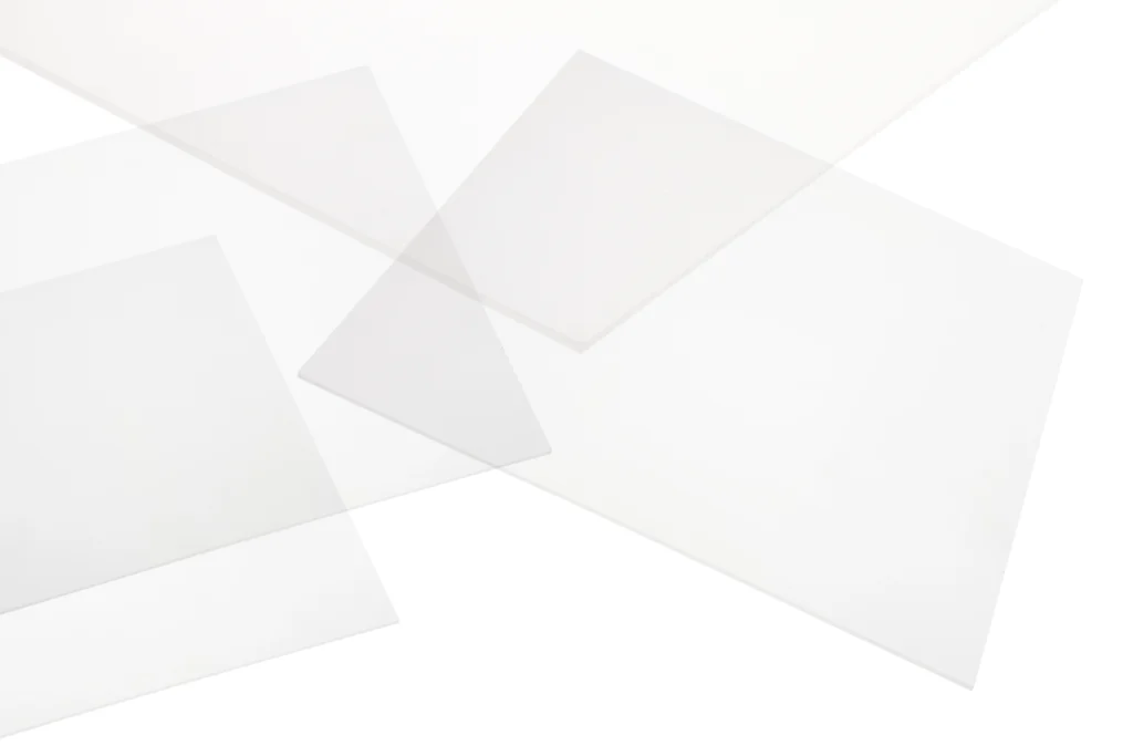 Different sheets of platinum cured silicone scattered on a white background.