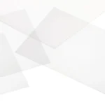 Different sheets of platinum cured silicone scattered on a white background.