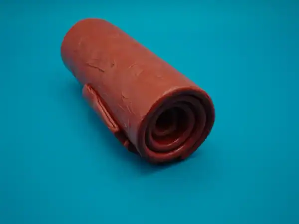 An image showing a roll of heat stabilised silicone rubber compound for high temperature applications.